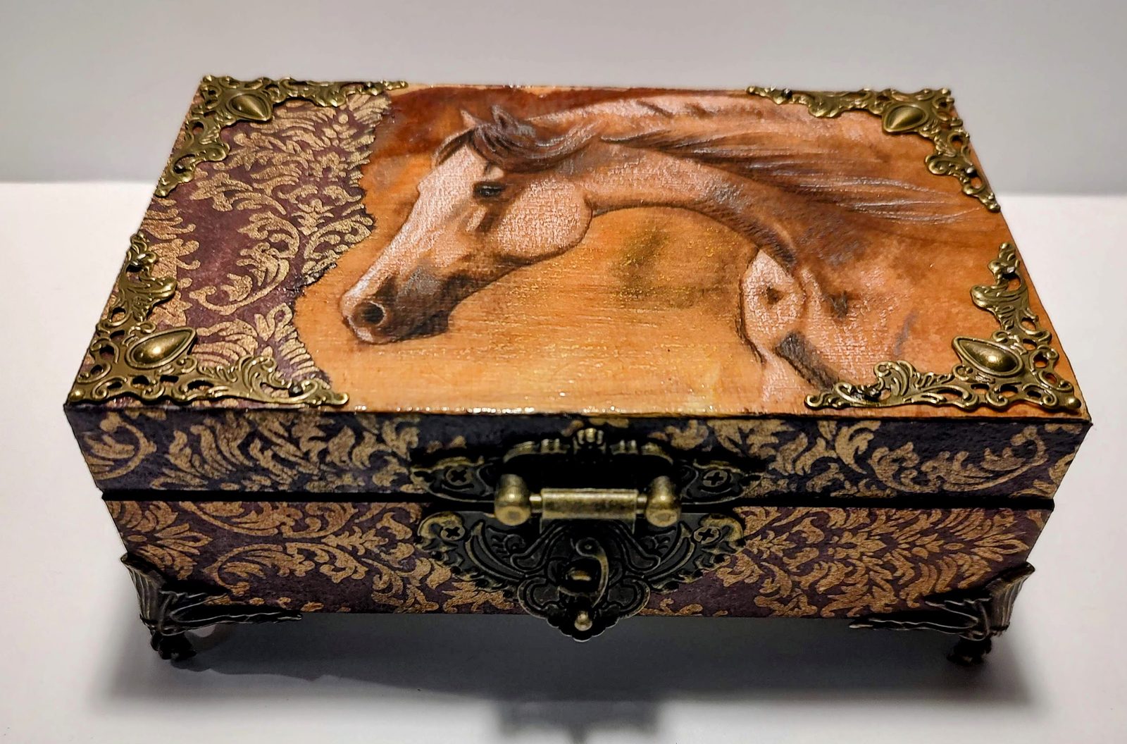 Baroque painted box — front, with a decoupage horse on the lid and gilt corners